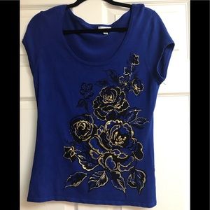 Sweater top with beaded design